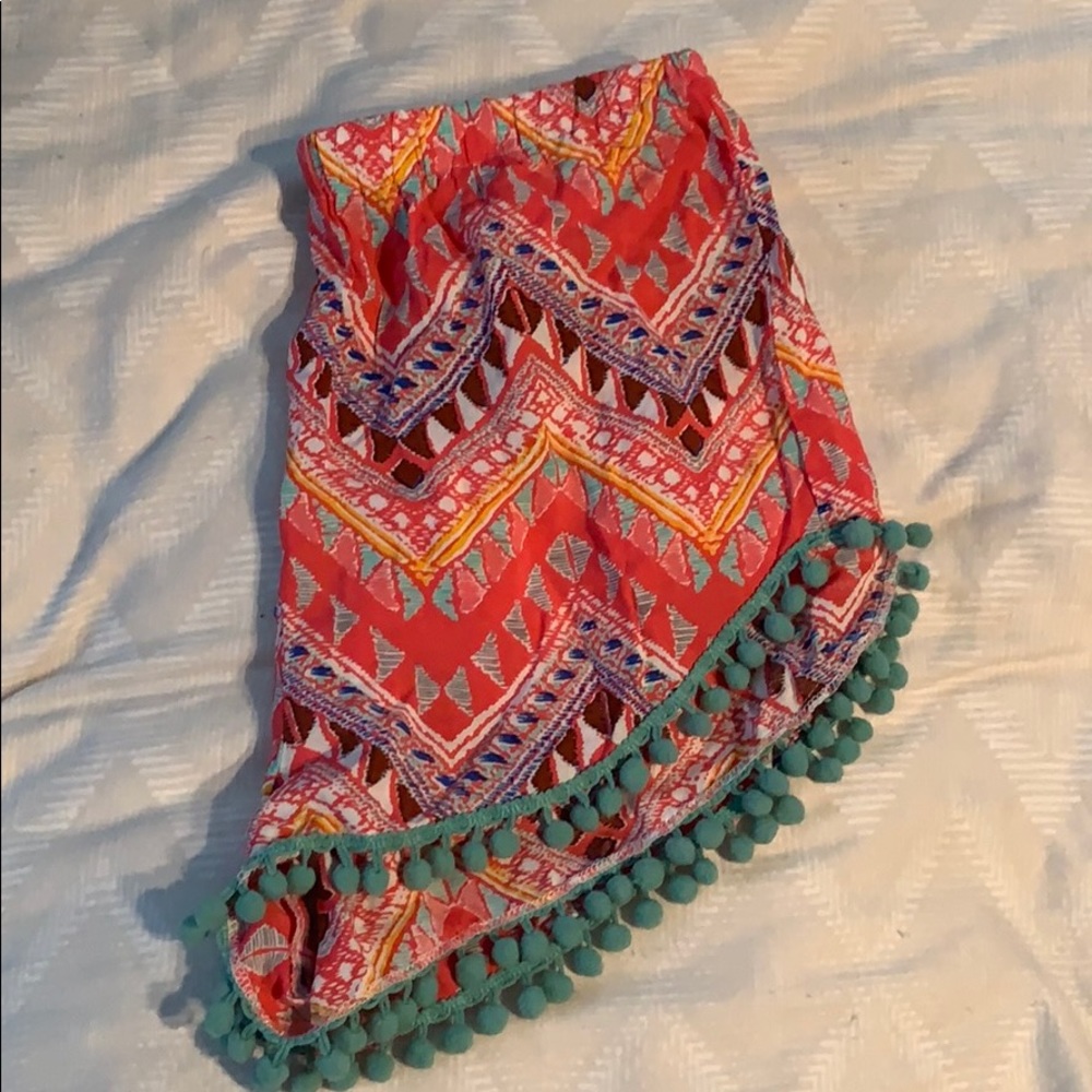 Adorable geometric shorts with ball tassels!